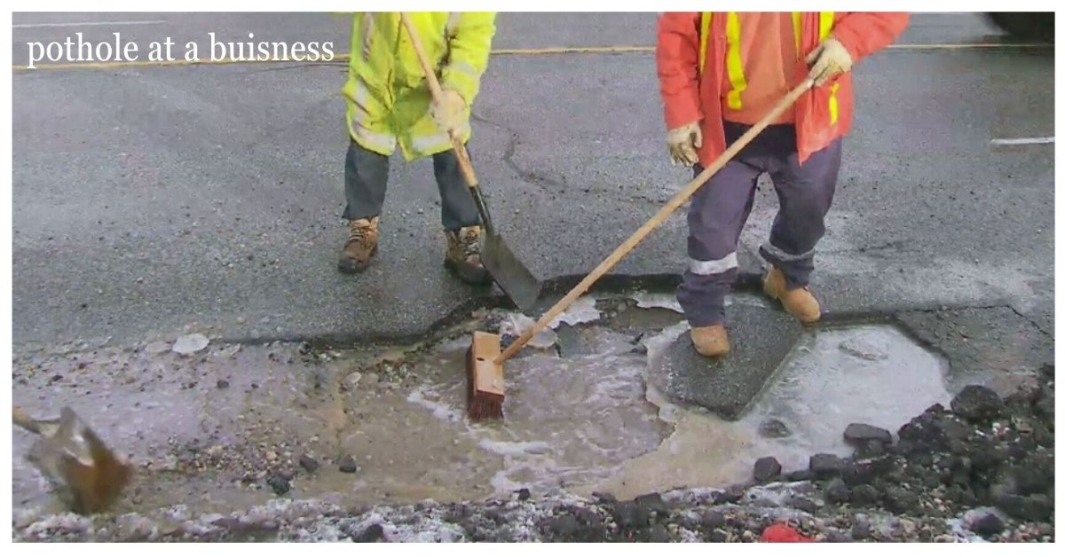 pothole at a buisness